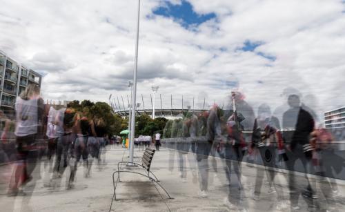 Crowd Streaming into MCG - Australian Stock Image