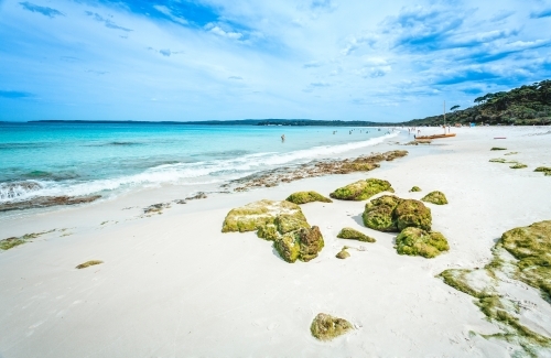 Crowds of tourists on Hyams Beach in summer - Australian Stock Image
