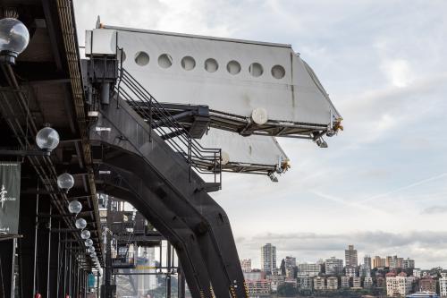 Passenger boarding gangway connecting terminal to a cruise ship, showing access point for boarding - Australian Stock Image