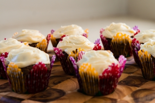 cupcakes with vanilla icing - Australian Stock Image