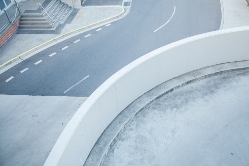 Curving ramp and grey road architecture