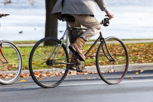 cyclist participating in a tweed ride on a heritage bike - Australian Stock Image