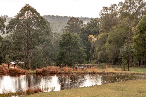 Dam with windmill - Australian Stock Image