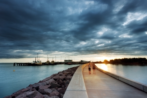 Darwin waterfront walking at sunset - Australian Stock Image