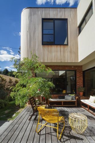 Deck patio courtyard in modern home extension renovation in Melbourne - Australian Stock Image