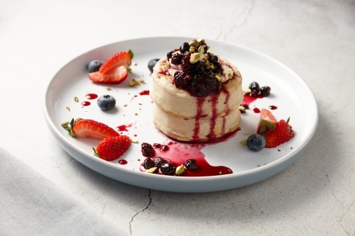 Delicious berry desert on plate - Australian Stock Image