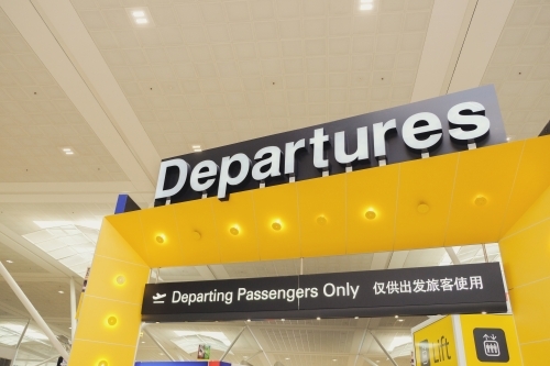 Departures sign at an airport - Australian Stock Image