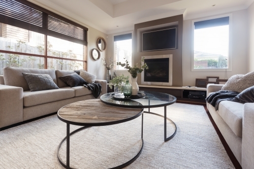 Designer family home casual living room in neutral tones and textures - Australian Stock Image