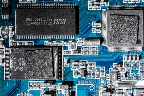 Detail of blue circuit board - Australian Stock Image