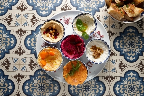 different flavours of hummus one one plate - Australian Stock Image