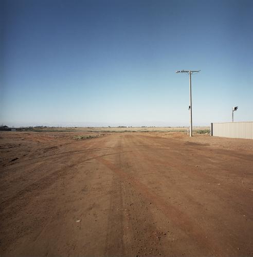 Dirt road in remote town leading to nowhere - Australian Stock Image