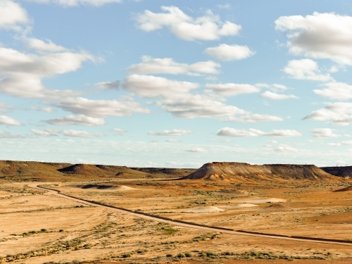 Dirt road though outback landscape - Australian Stock Image