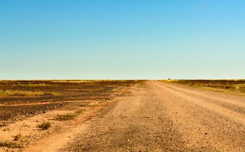 Dirt road through the Gibber Country to the Simpson Desert
