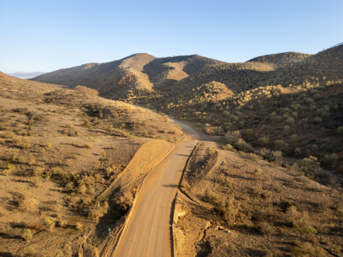 dirt road through the hills in Arkaroola Flinders Ranges - Australian Stock Image