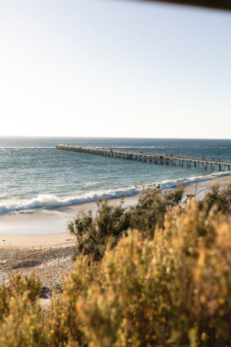 Distant view of Port Noarlunga Jetty at Sunset - Australian Stock Image
