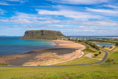 Distant view of The Nut along the coastline. - Australian Stock Image