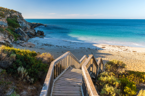 Dolphin Beach with boardwalk at sunset, Yorke Peninsula, Innes National Park, South Australia - Australian Stock Image