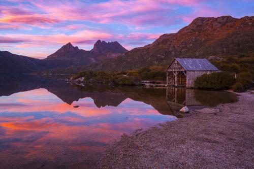 Dove Lake and boatshed at dawn - Australian Stock Image