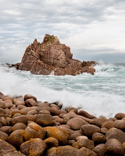 Down on the rocks at Cape Woolamai, Phillip Island - Australian Stock Image