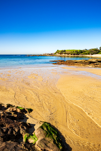 dramatic coastal landscape of Little Bay beach - Australian Stock Image