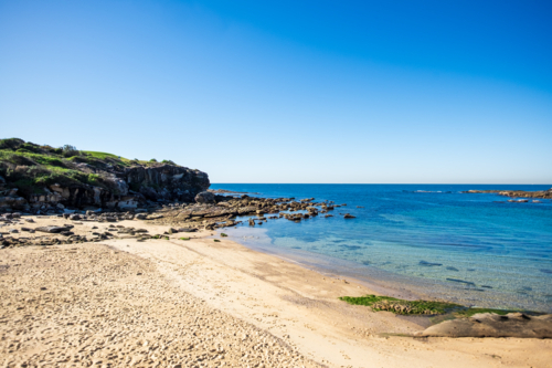 dramatic coastal landscape of Little Bay beach - Australian Stock Image