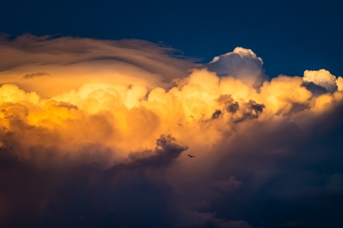 Dramatic storm clouds at sunset - Australian Stock Image