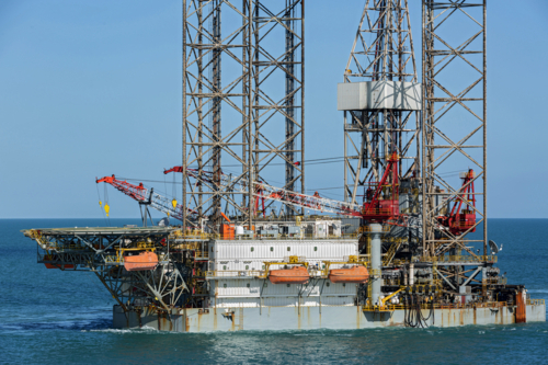 Drill rig transfer at sea - Australian Stock Image