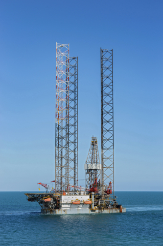 Drilling rig transfer at sea - Australian Stock Image