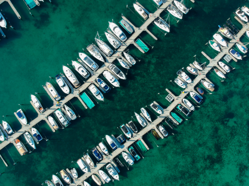 Drone image of boats and yachts in marina of boat club - Australian Stock Image