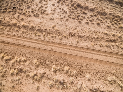 Drone shot looking down of outback road - Australian Stock Image