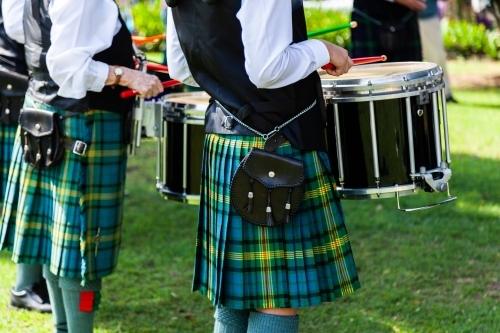 Drummers in band wearing kilts - Australian Stock Image