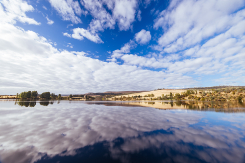Dunrobin Bridge views of Meadowbank Lake and River Derwent on a cool summer's morning near Ouse - Australian Stock Image