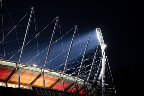 Dusk view of Melbourne's famous skyline and Melbourne Cricket Ground stadium in Melbourne, Victoria - Australian Stock Image