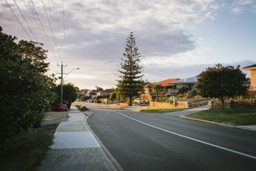 Early morning light along a street in suburban Perth WA - Australian Stock Image