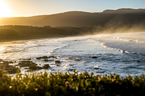 early morning misty beach scene - Australian Stock Image
