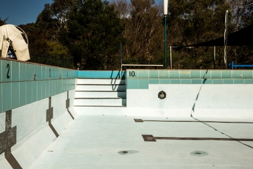 Edge of empty swimming pool - Australian Stock Image