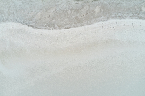 Edge pattern and texture of the surface on a dry salt lake in Western Australia. - Australian Stock Image