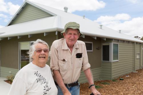 Elderly couple at newly constructed retirement home