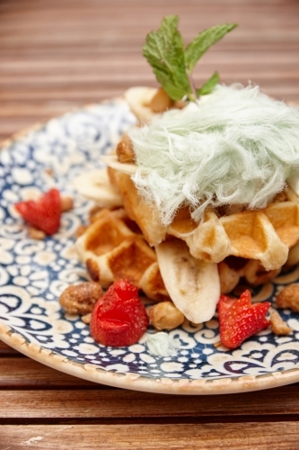 Elegant waffle dessert on table - Australian Stock Image