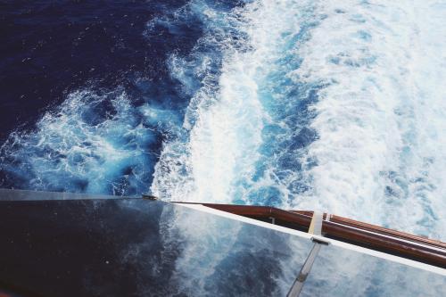 Elevated view down towards water behind a cruise ship - Australian Stock Image