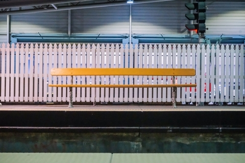 Empty bench at train station - Australian Stock Image