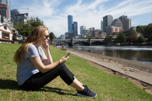 Enjoying the Sun Next to the Yarra River - Australian Stock Image