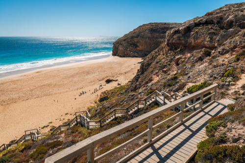 Ethel Wreck Beach boardwalk viewed  from the lookout towards the ocean on a bright day - Australian Stock Image