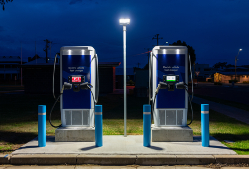 EV car chargers at night in Inverell, New South Wales - Australian Stock Image