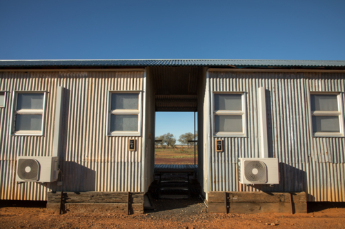 External view of accommodation building with entry hall in the middle - Australian Stock Image