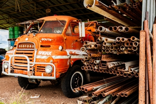 Farm fire brigade truck parked in shed - Australian Stock Image