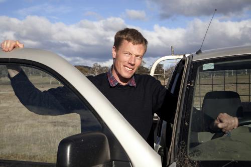 Farmer getting into his ute - Australian Stock Image
