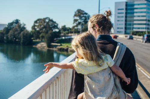 Father and daughter in city - Australian Stock Image