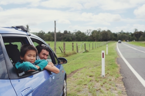 father and son in the car on side road - Australian Stock Image