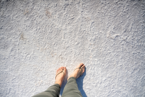 feet on salt at Lake Hart - Australian Stock Image